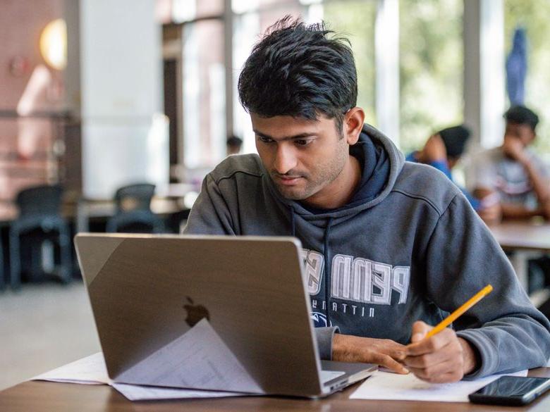 student with laptop 
